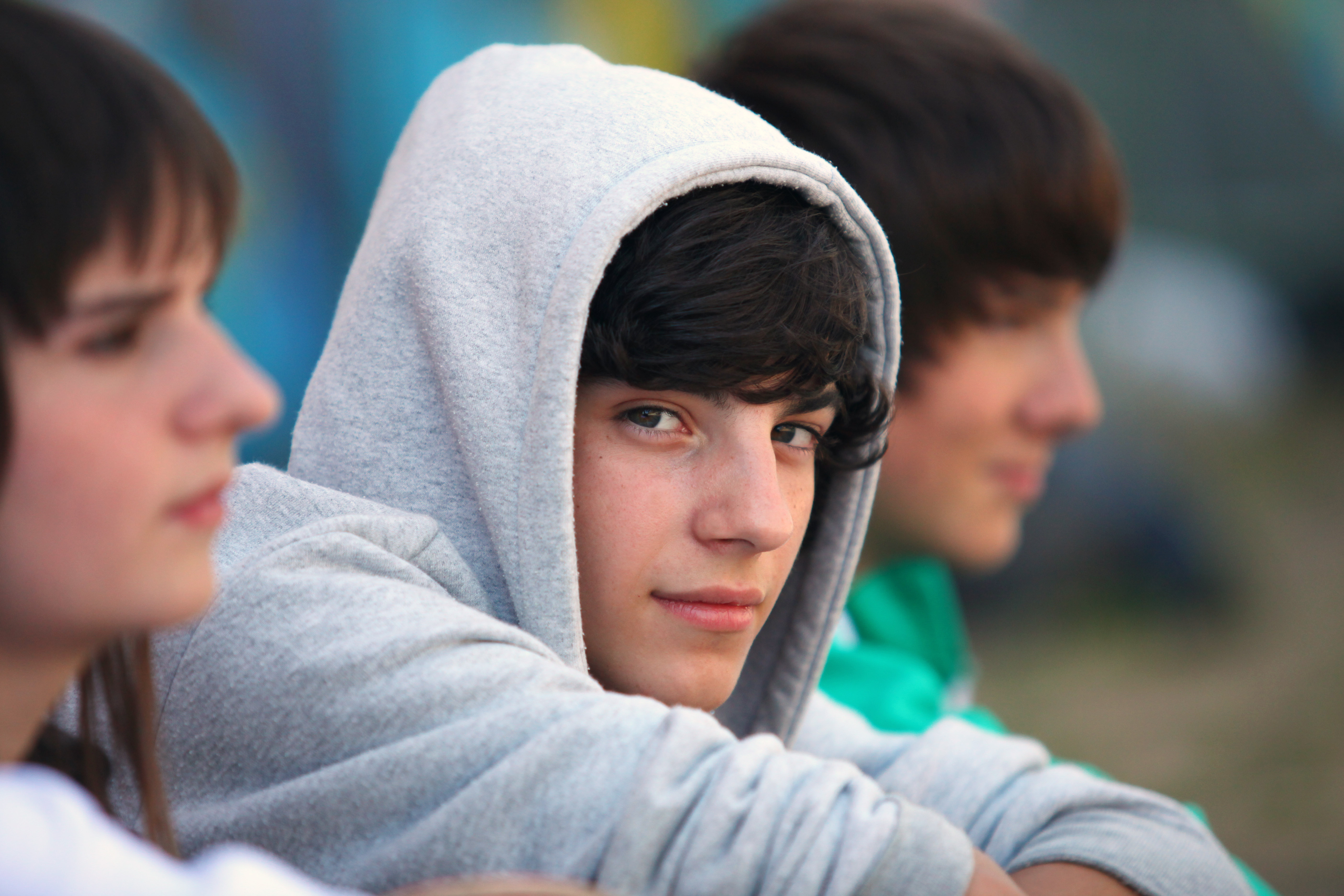 Three teenagers sat together